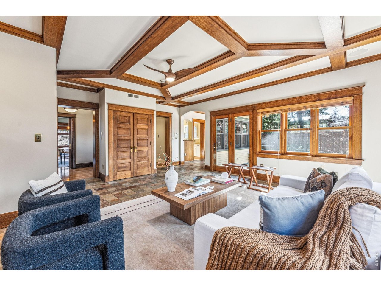 851 14th Street Boulder, CO 80302 - Photo 17 of 50 a living room with furniture and floor to ceiling windows