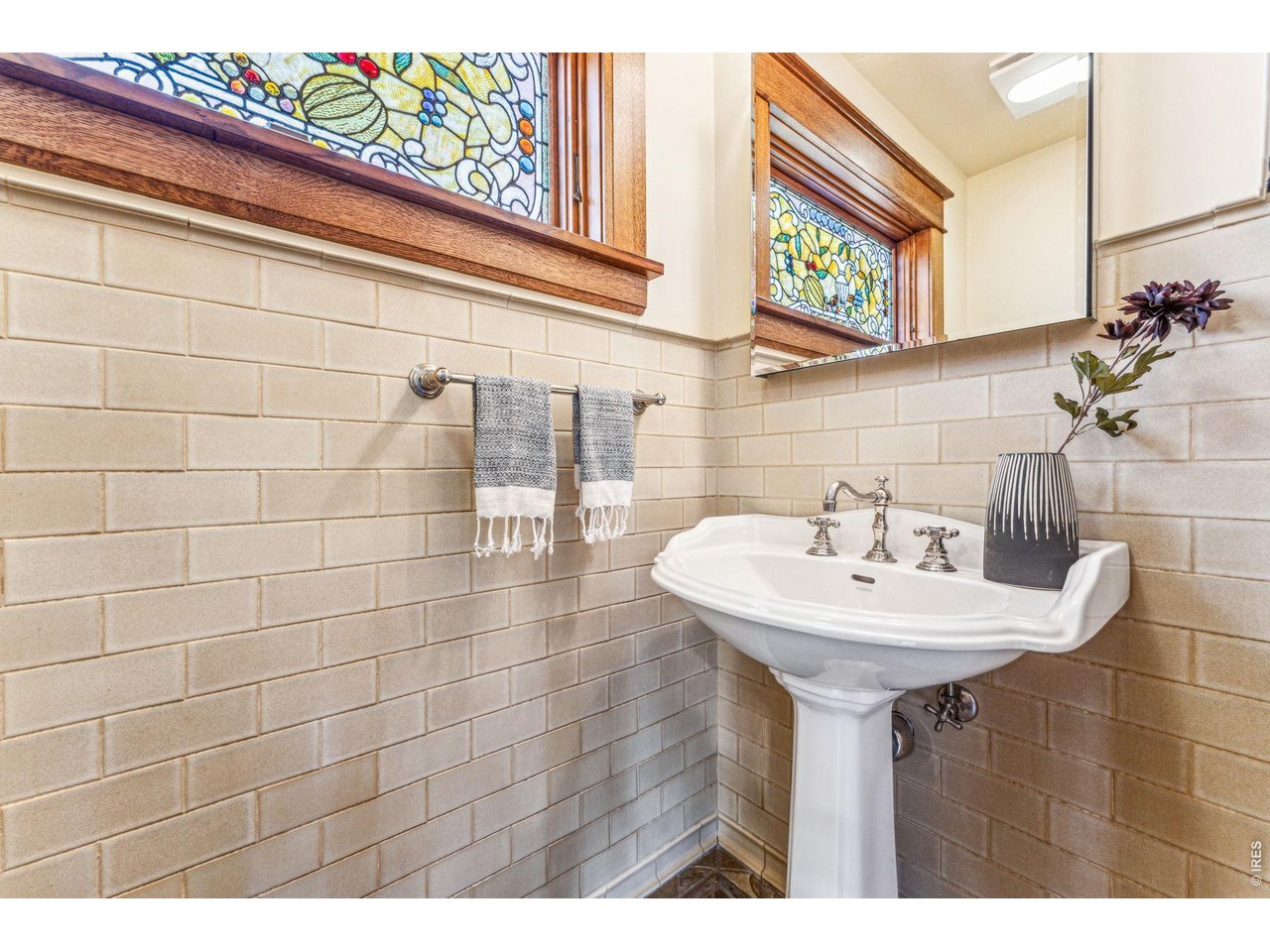 851 14th Street Boulder, CO 80302 - Photo 28 of 50 a bathroom with a sink and a mirror