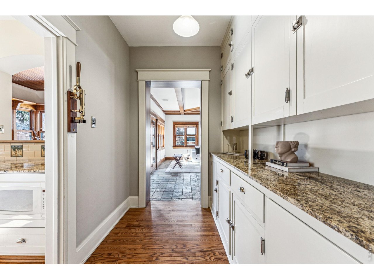 851 14th Street Boulder, CO 80302 - Photo 29 of 50 a kitchen with stainless steel appliances granite countertop a refrigerator and a sink
