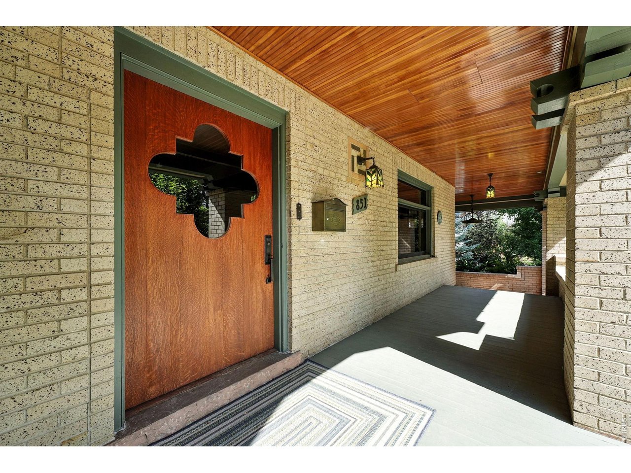 851 14th Street Boulder, CO 80302 - Photo 9 of 50 a view of a wooden door and a window