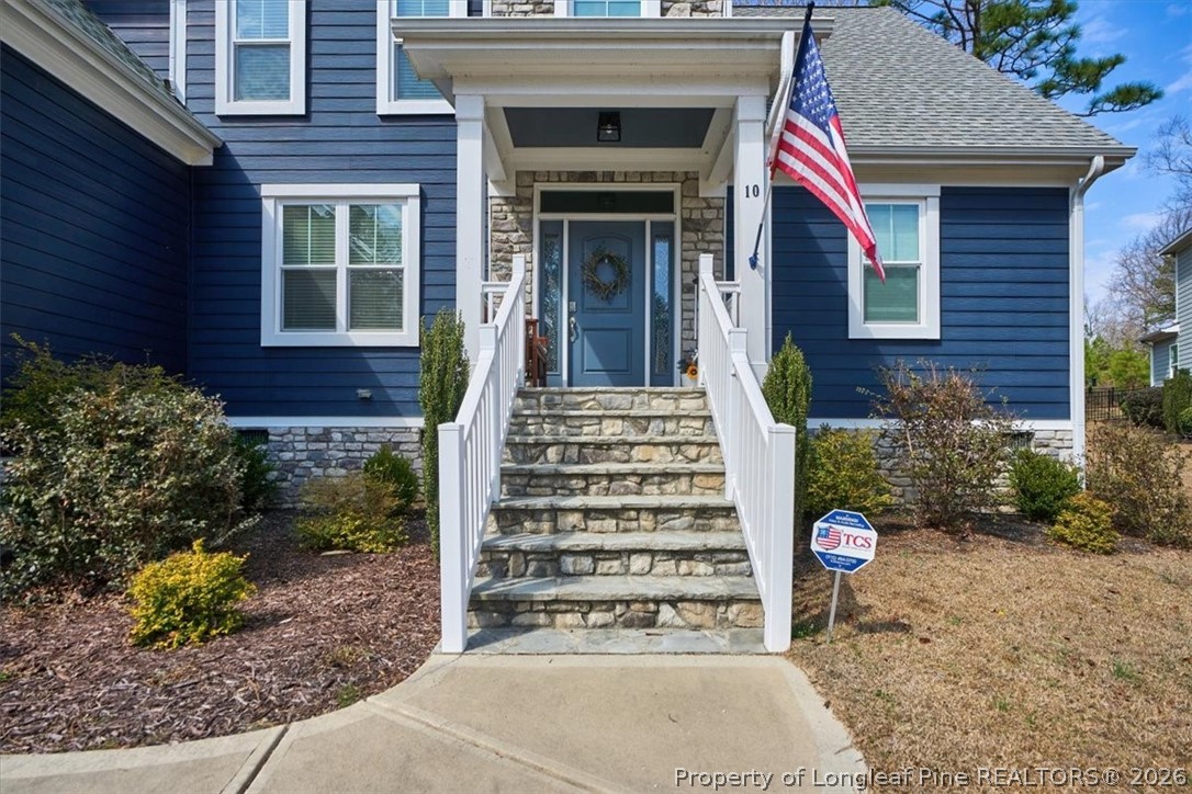 10 Heatherspring Way Spring Lake, NC 28390 - Photo 2 of 48 a front view of a house with a garden