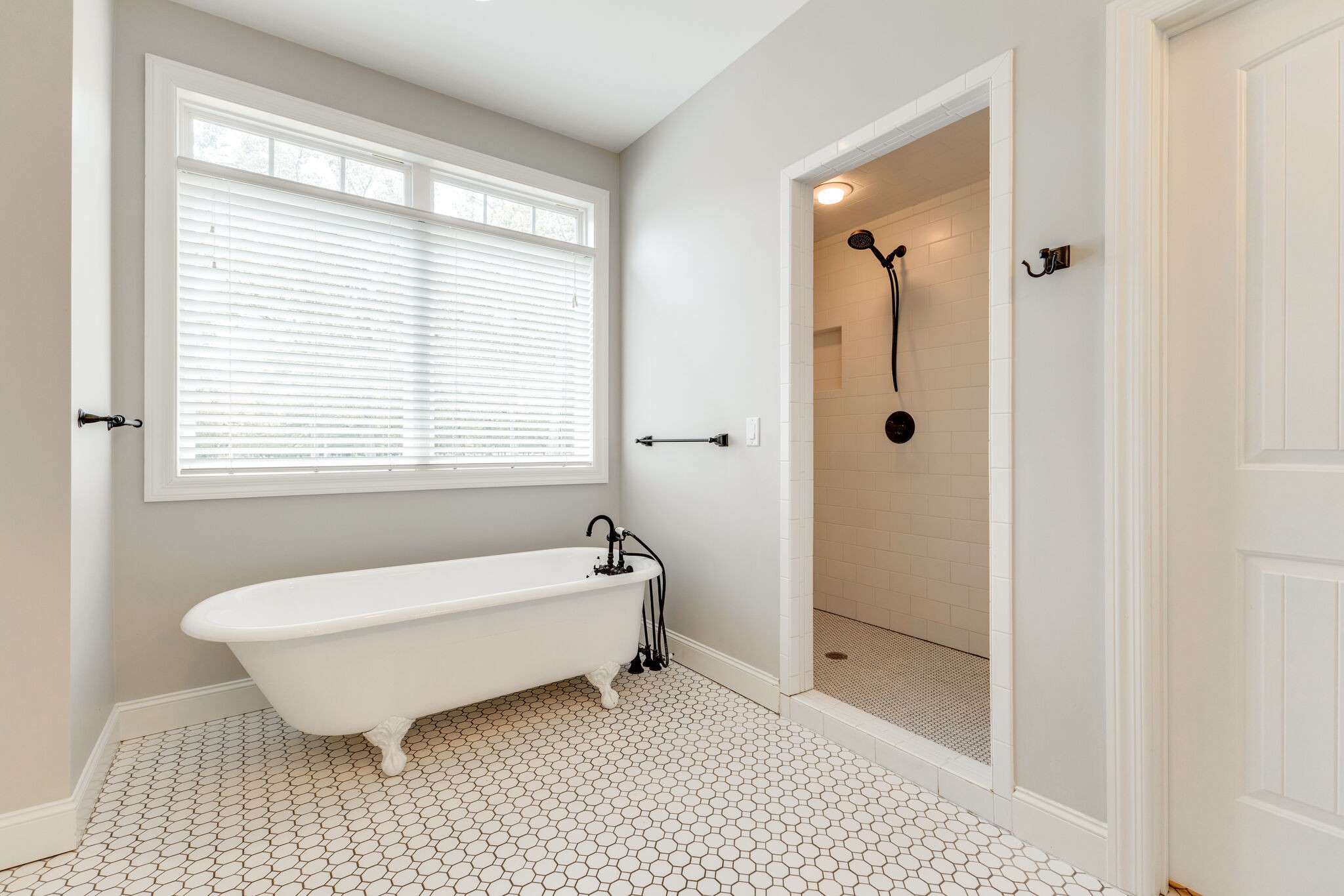 631 Still Pond Road Columbia, TN 38401 - Photo 26 of 70 a bathroom with a bathtub and a shower