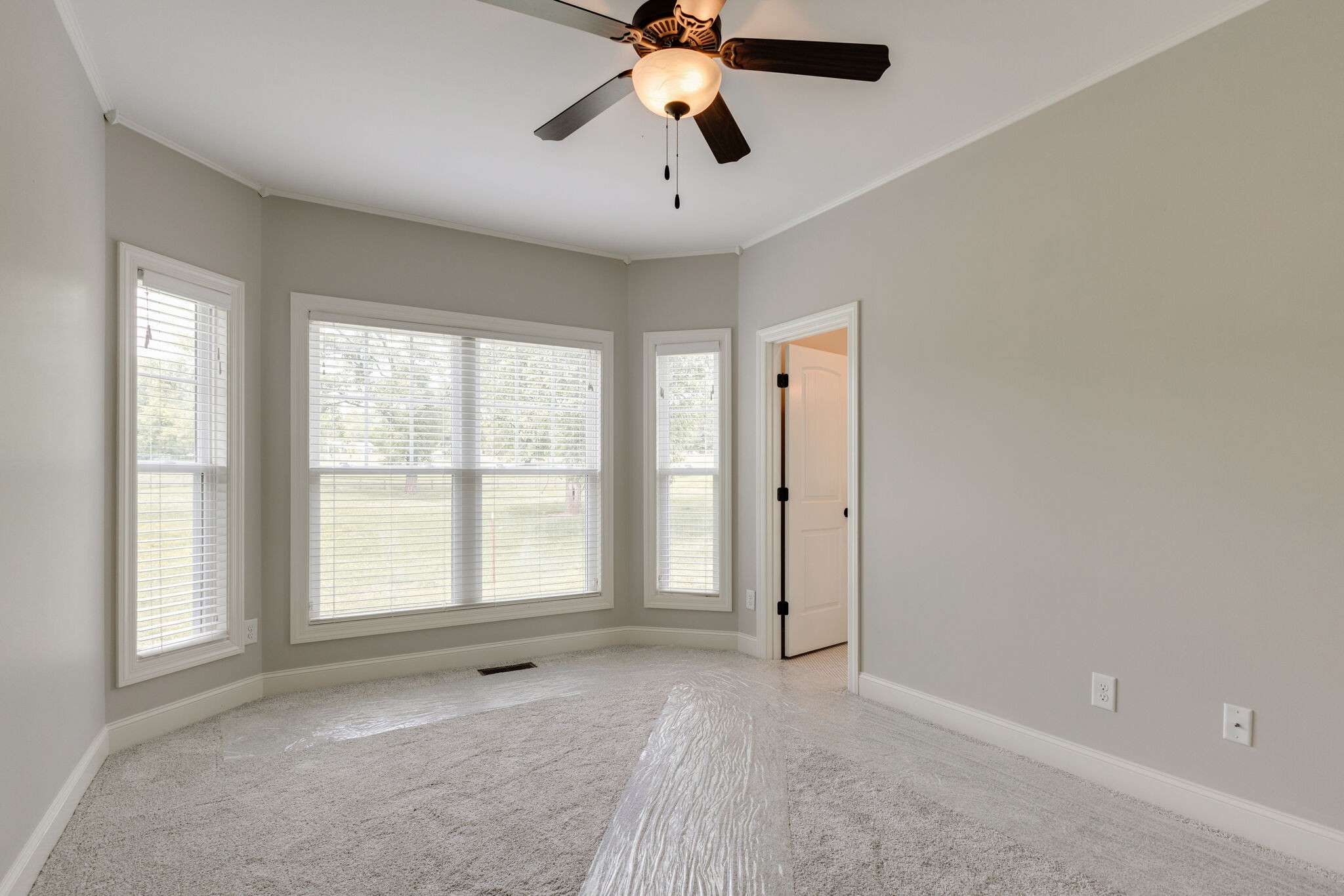 631 Still Pond Road Columbia, TN 38401 - Photo 29 of 70 a view of an empty room with window and chandelier fan