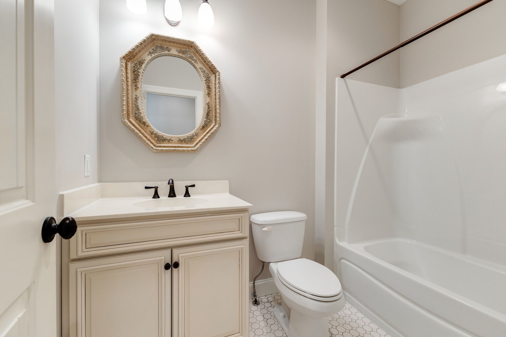 631 Still Pond Road Columbia, TN 38401 - Photo 46 of 70 a bathroom with a sink a toilet and a mirror
