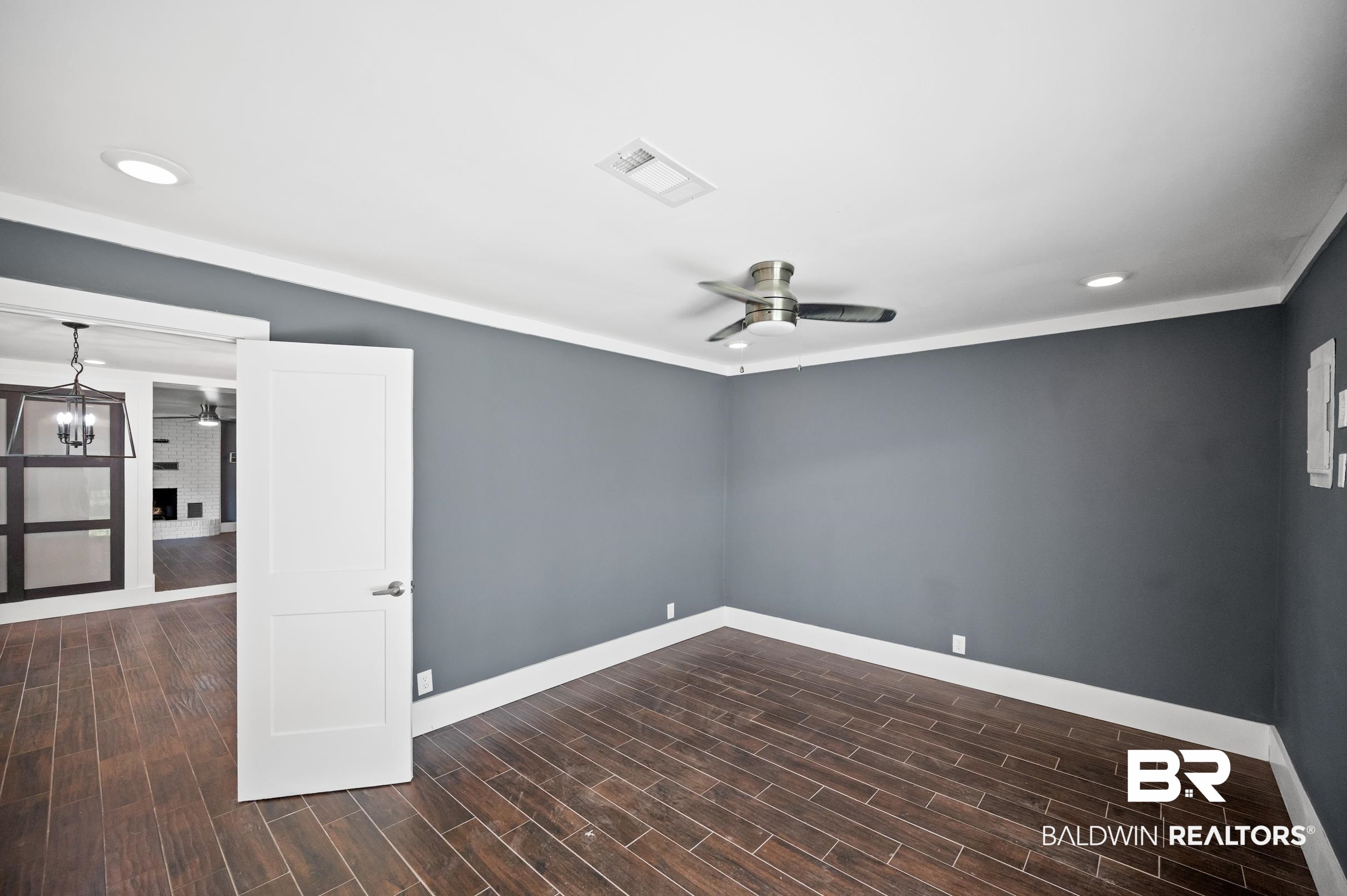 24663 Chestnut Street Elberta, AL 36530 - Photo 11 of 22 Room featuring wood-finish flooring, recessed lighting, and a ceiling fan