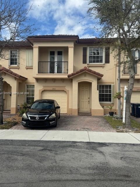 a car parked in front of a house
