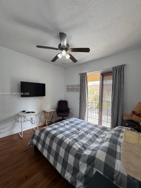12923 Southwest 135th Terrace Miami, FL 33186 - Photo 31 of 71 a bedroom with a bed and a flat screen tv