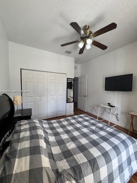 12923 Southwest 135th Terrace Miami, FL 33186 - Photo 32 of 71 a bedroom with a bed and a flat screen tv