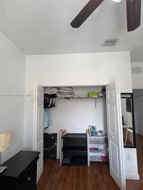 12923 Southwest 135th Terrace Miami, FL 33186 - Photo 34 of 71 a view of walk in closet with clothes and shoes