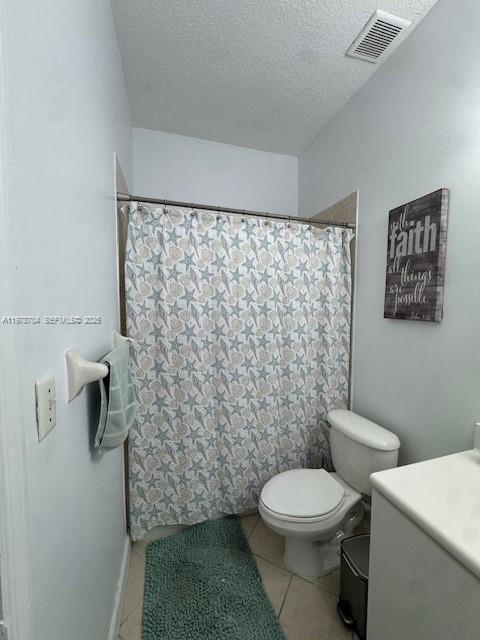 12923 Southwest 135th Terrace Miami, FL 33186 - Photo 36 of 71 a bathroom with a toilet and a shower