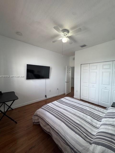 12923 Southwest 135th Terrace Miami, FL 33186 - Photo 39 of 71 a bedroom with a bed and a ceiling fan