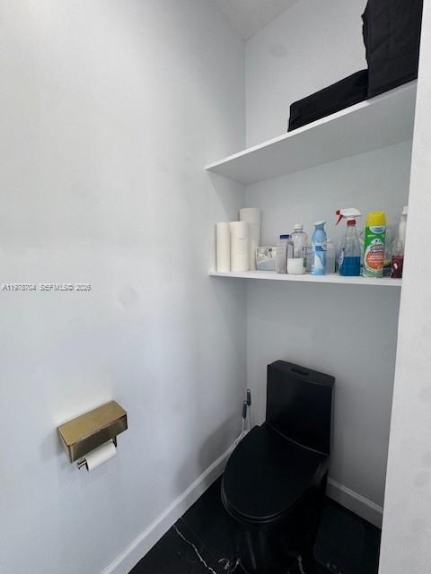 12923 Southwest 135th Terrace Miami, FL 33186 - Photo 56 of 71 a workspace with furniture and wooden floor