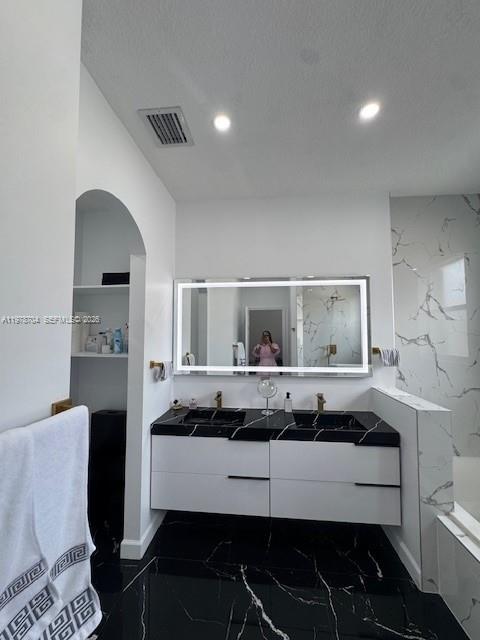 12923 Southwest 135th Terrace Miami, FL 33186 - Photo 60 of 71 a bedroom with a bed and wooden floor