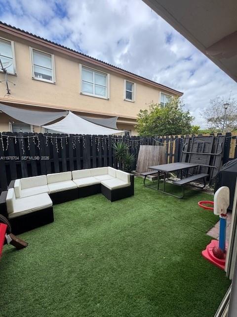 12923 Southwest 135th Terrace Miami, FL 33186 - Photo 61 of 71 a view of a house with backyard and sitting area