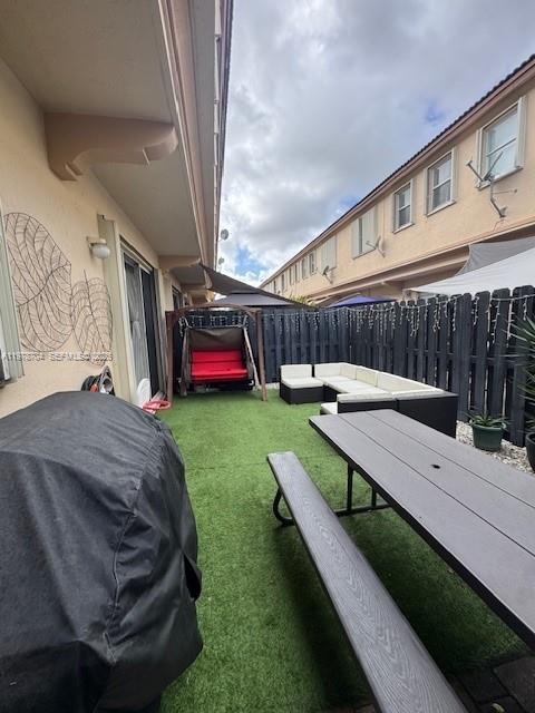 12923 Southwest 135th Terrace Miami, FL 33186 - Photo 62 of 71 a view of a backyard with sitting area
