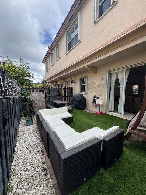 12923 Southwest 135th Terrace Miami, FL 33186 - Photo 63 of 71 a view of a house with backyard and porch