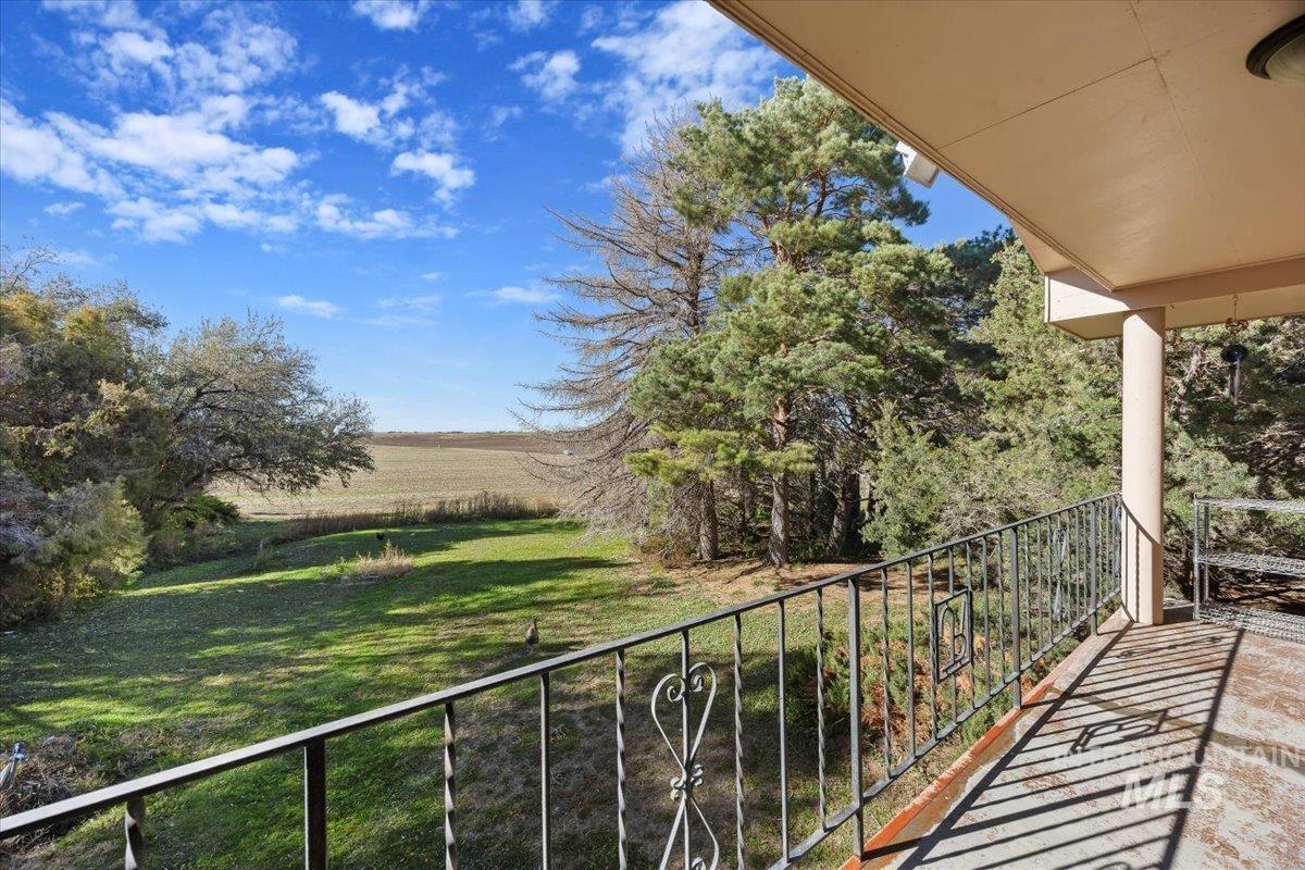 173 Main Line Ranch Road Rupert, ID 83350 - Photo 36 of 47 Balcony featuring a view of rural / pastoral area