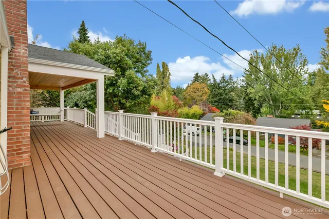 a view of a house with a yard and garden