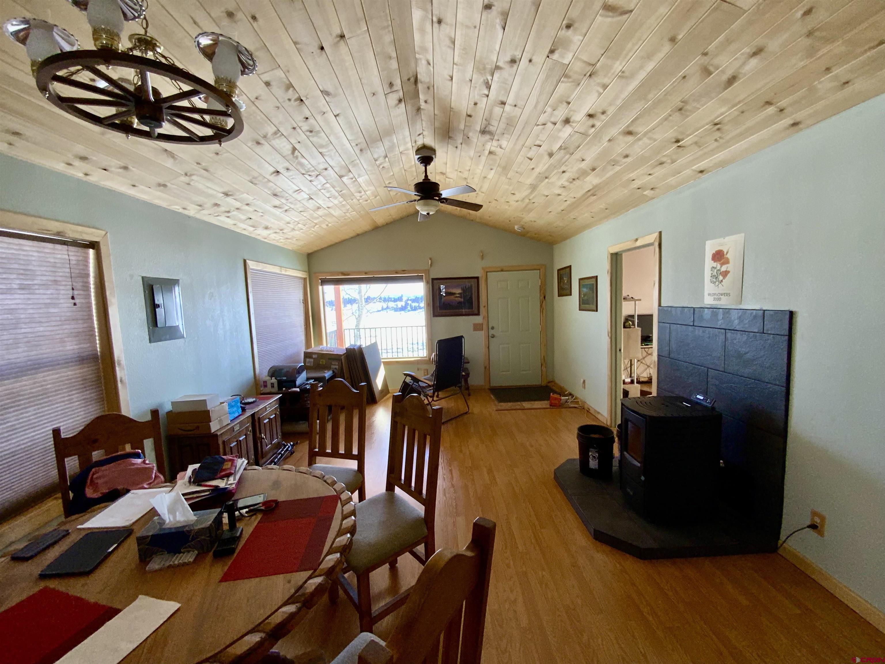 1019 Uncompahgre Drive Powderhorn, CO 81243 - Photo 16 of 33 a living room with furniture and wooden floor