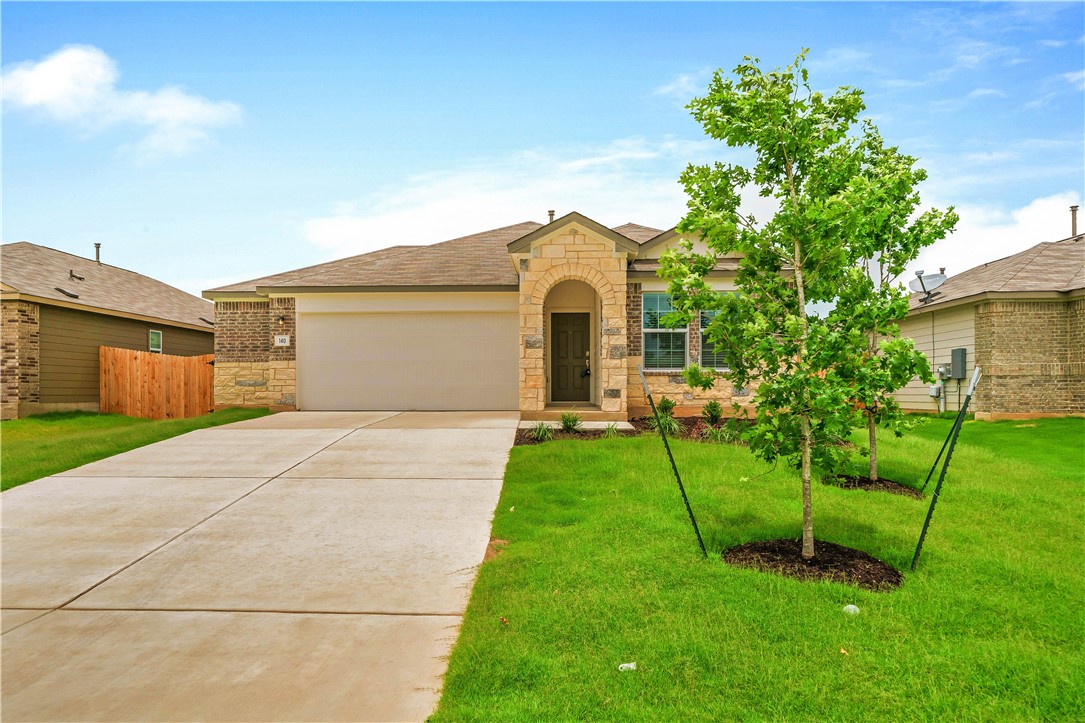 a house view with a garden space