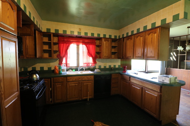 211 Old Elm Road Joliet, IL 60433 - Photo 5 of 12 a kitchen with large windows and sink