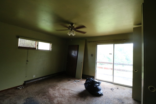 211 Old Elm Road Joliet, IL 60433 - Photo 7 of 12 wooden floor and window in an empty room