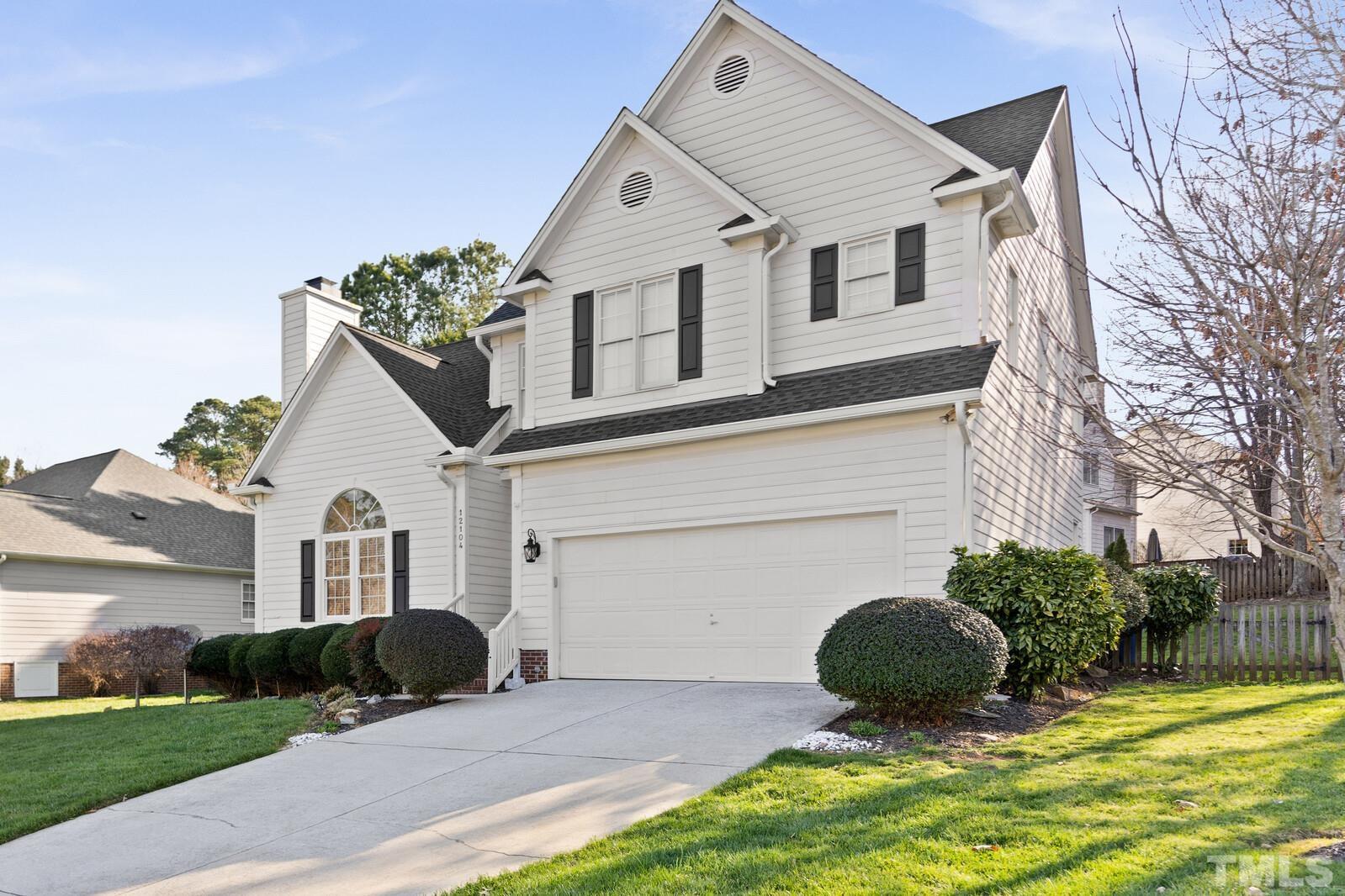 12104 Amoretto Way Raleigh, NC 27613 - Photo 1 of 21 a view of a house with backyard and garden