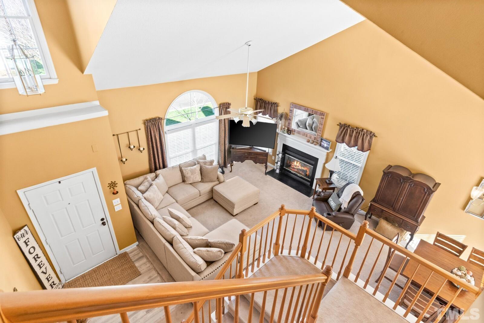 12104 Amoretto Way Raleigh, NC 27613 - Photo 11 of 21 a view of a living room with furniture