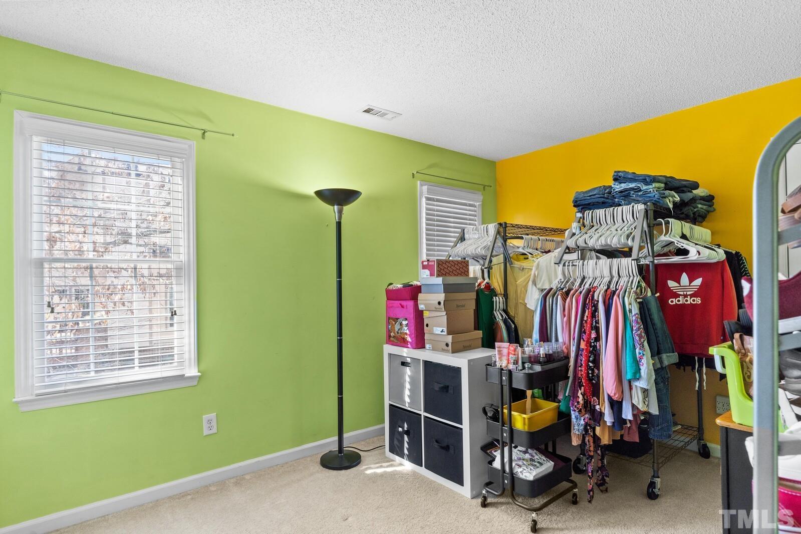 12104 Amoretto Way Raleigh, NC 27613 - Photo 18 of 21 a view of a room with gym equipment