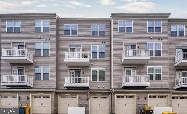 a front view of a building with glass windows