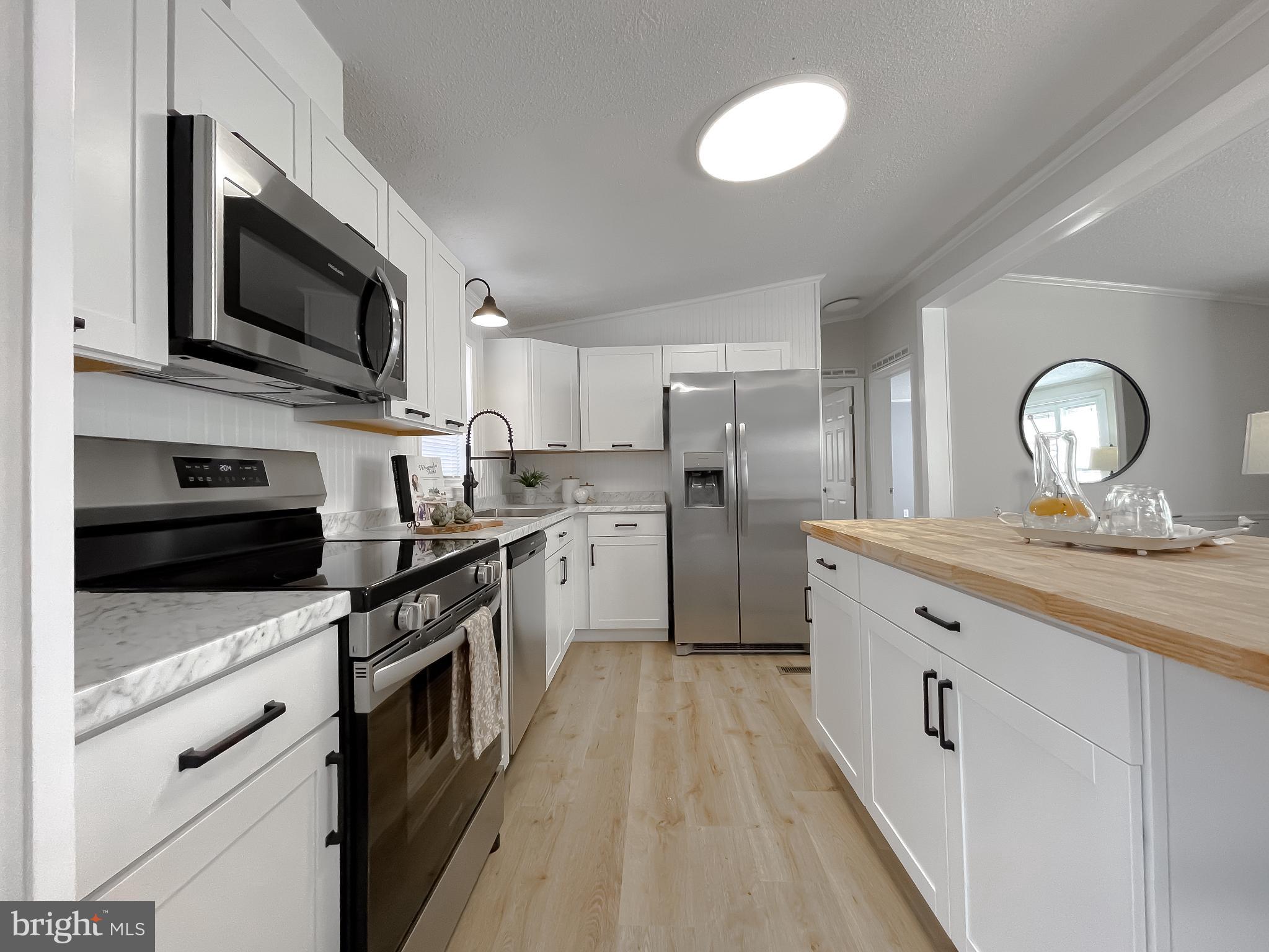 45908 South Springsteen Court California, MD 20619 - Photo 12 of 35 Bright, upgraded kitchen with plenty of workspace.