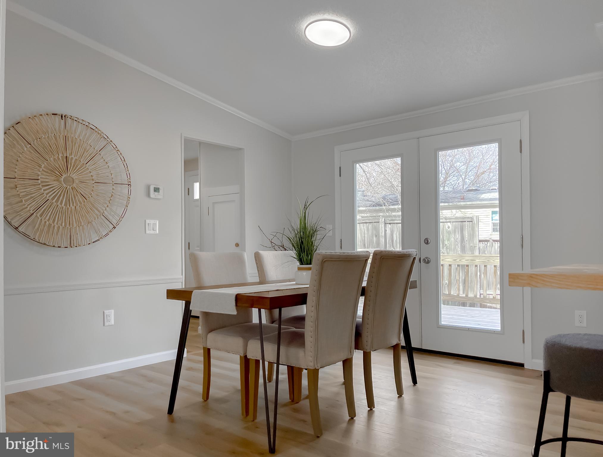 45908 South Springsteen Court California, MD 20619 - Photo 16 of 35 Inviting dining space with access to large deck.