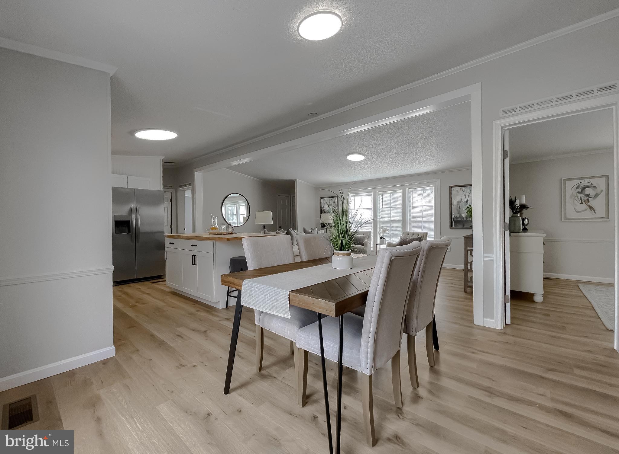 45908 South Springsteen Court California, MD 20619 - Photo 19 of 44 Bright and airy open-concept living space.