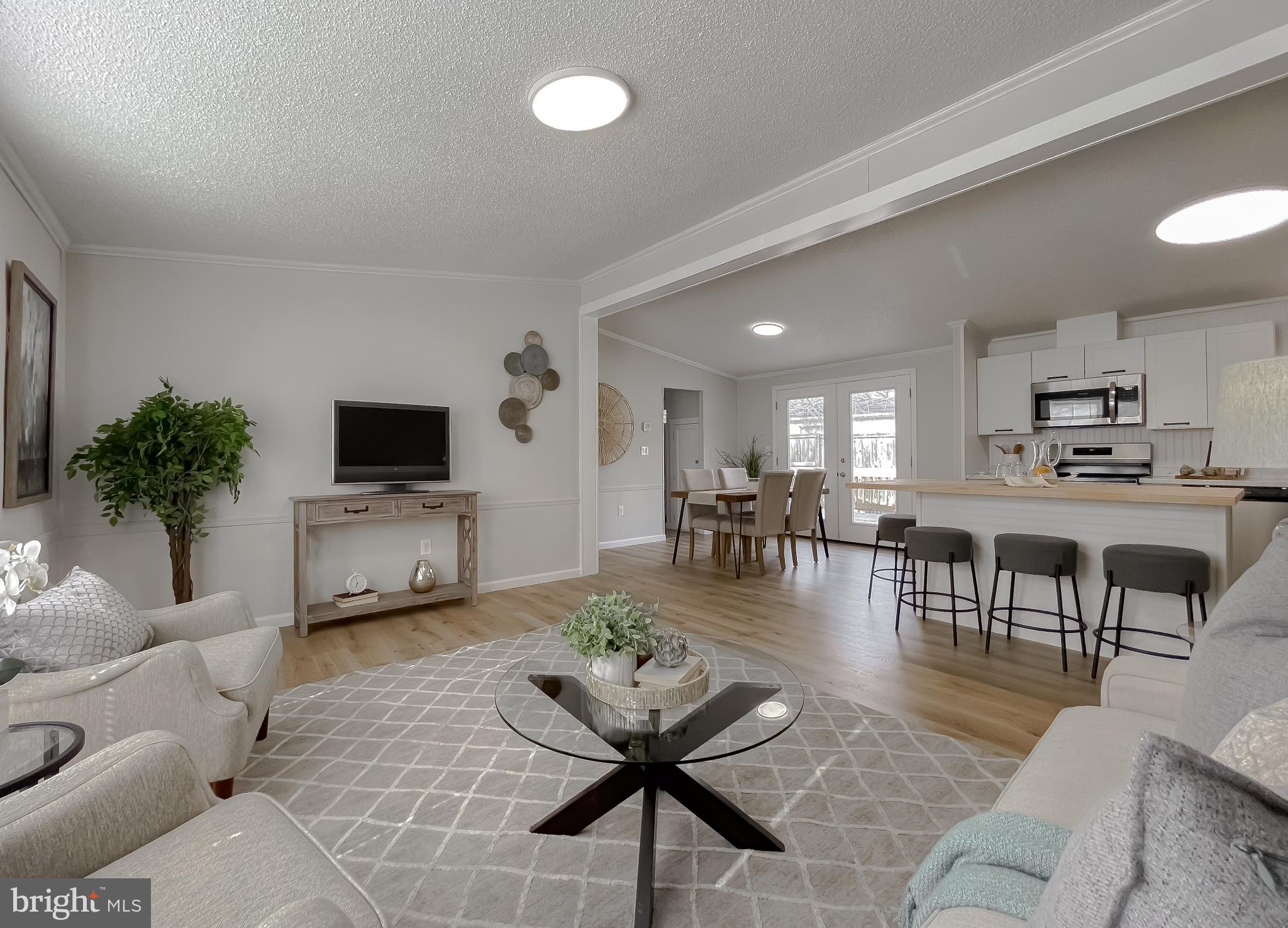 45908 South Springsteen Court California, MD 20619 - Photo 2 of 44 Bright and inviting open-concept living space.