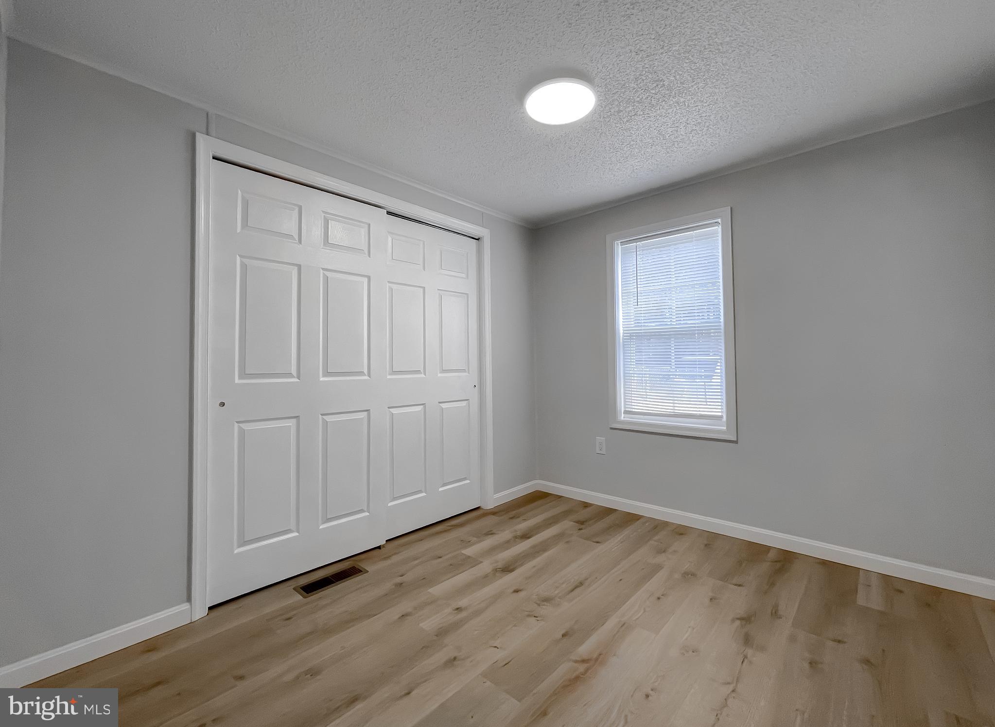 45908 South Springsteen Court California, MD 20619 - Photo 29 of 35 Charming 2nd Bedroom with Large Closet.