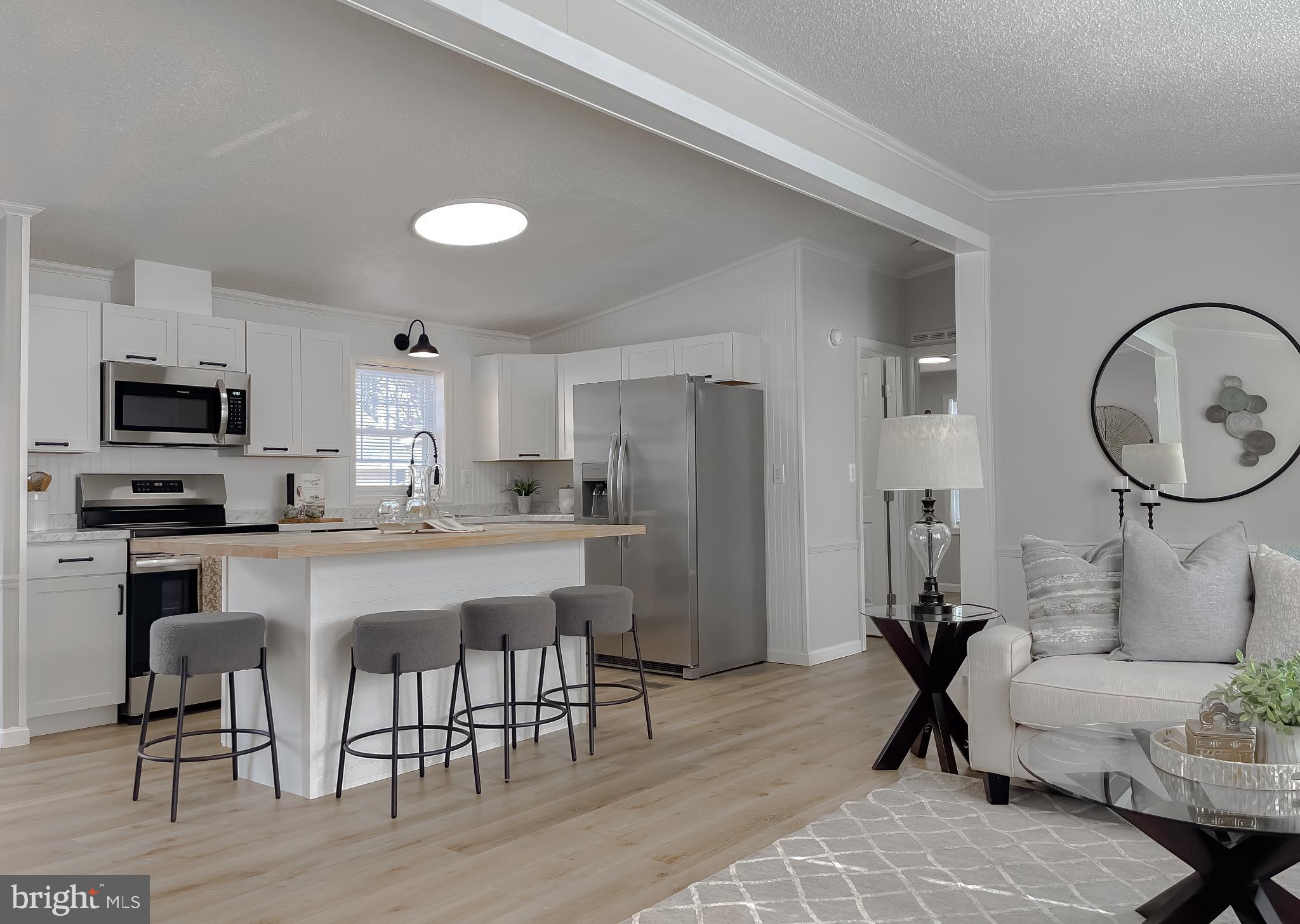 45908 South Springsteen Court California, MD 20619 - Photo 7 of 35 Bright, upgraded kitchen with extra seating.