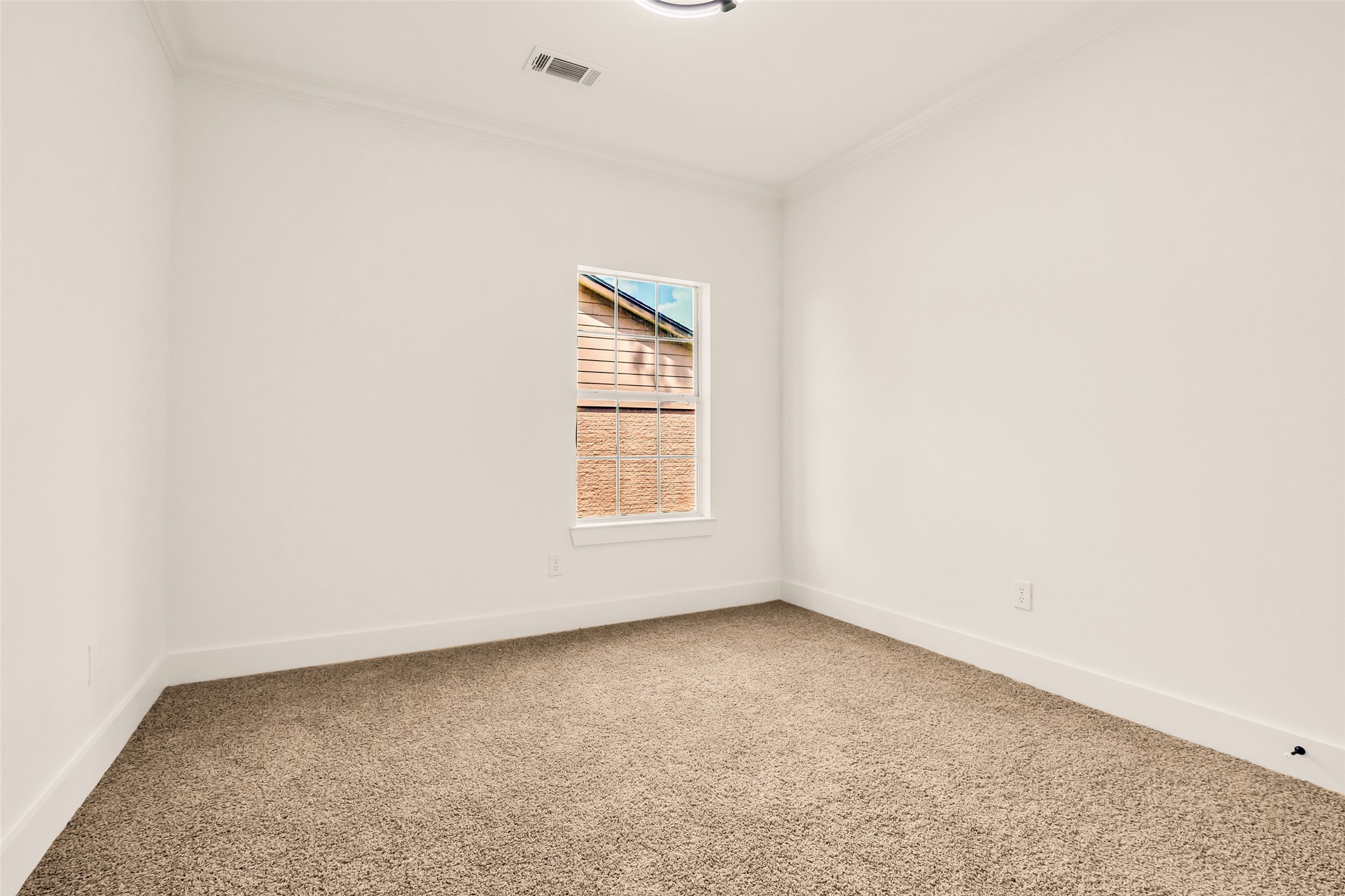 407 Harris Road Highlands, TX 77562 - Photo 23 of 32 an empty room with a window