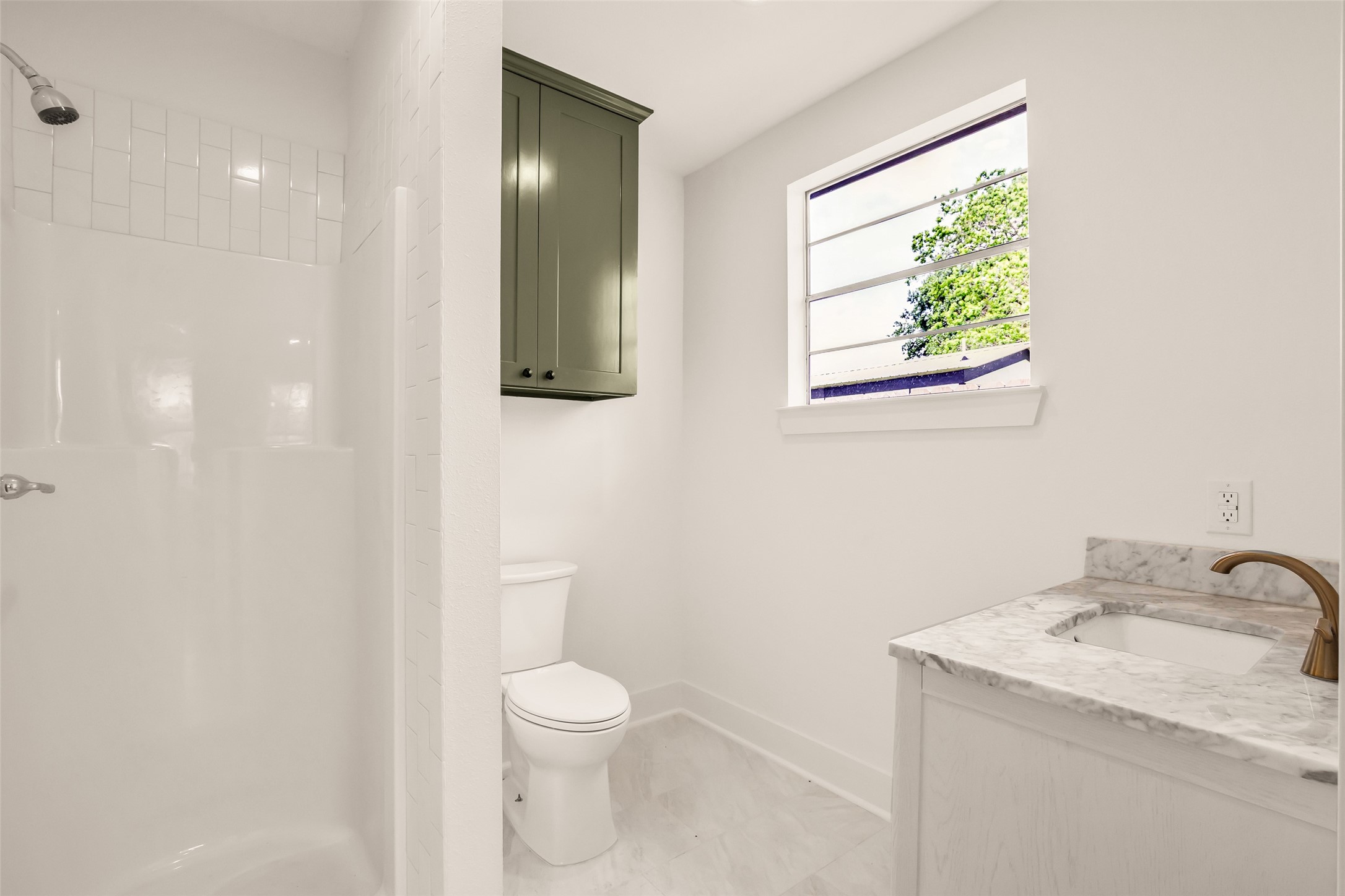 407 Harris Road Highlands, TX 77562 - Photo 31 of 32 a bathroom with a toilet sink and mirror