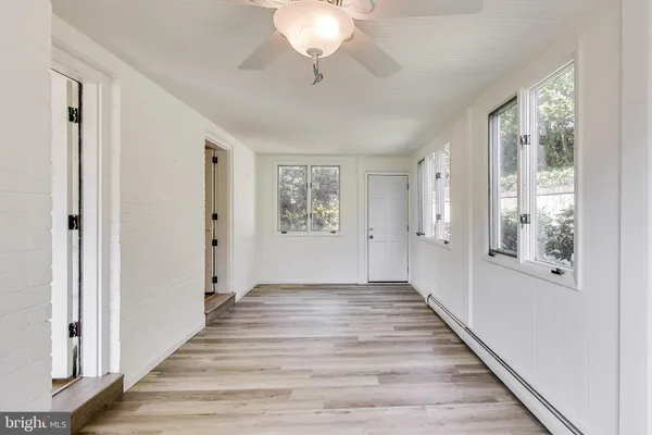 an empty room with windows