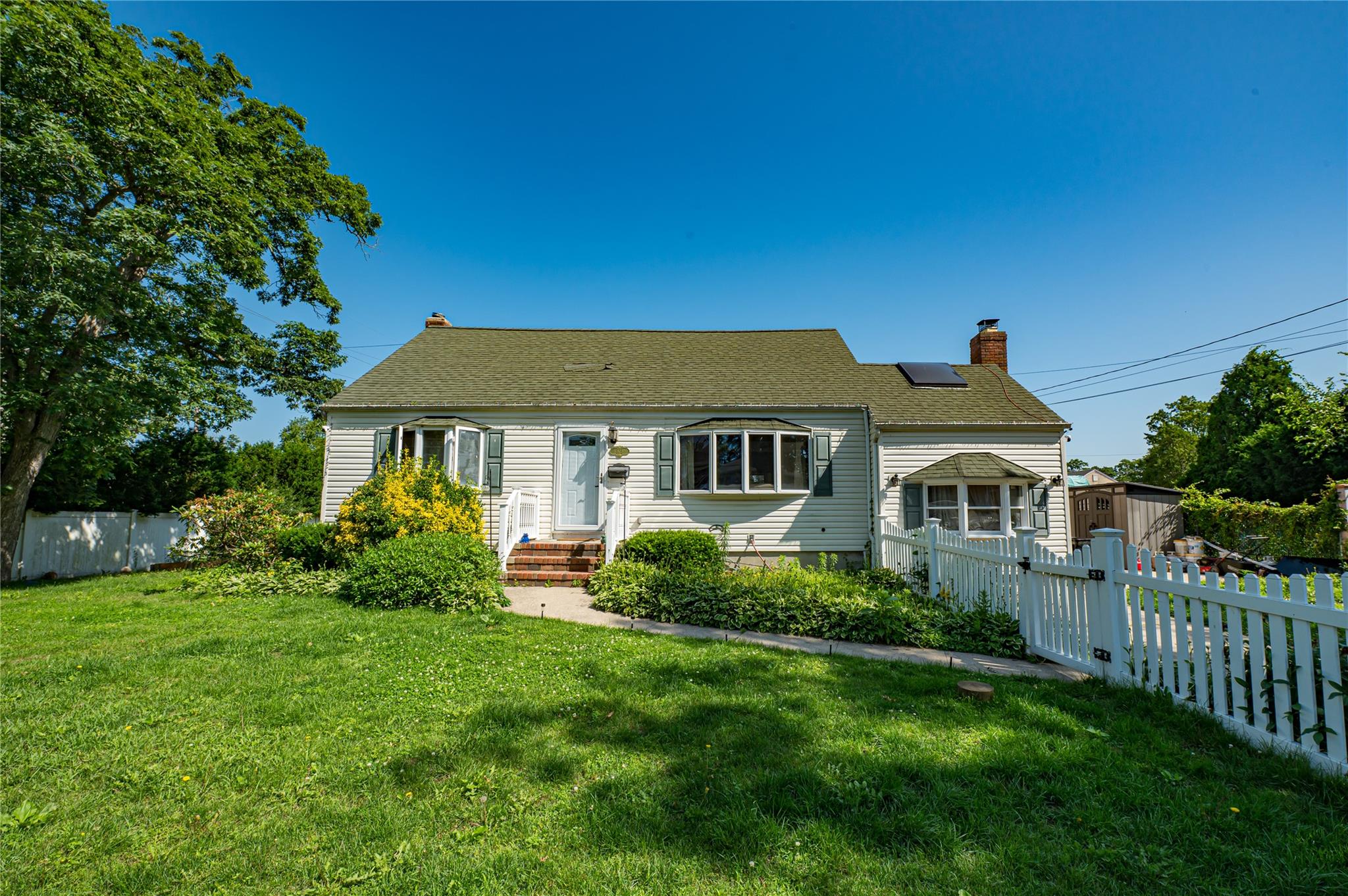 805 Arlington Road West Babylon, NY 11704 - Photo 1 of 1 a aerial view of a house with a yard