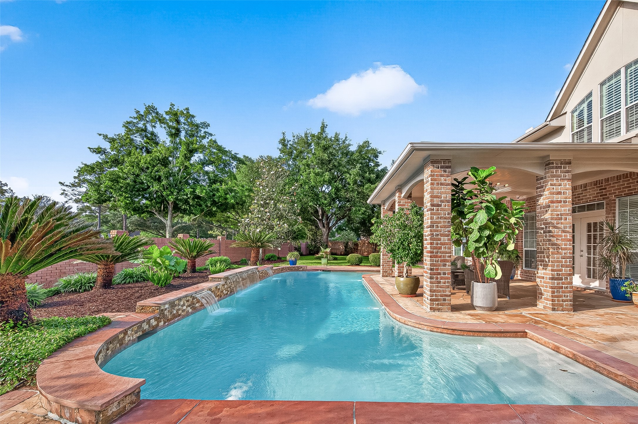 4203 Deforest Ridge Circle Katy, TX 77494 - Photo 42 of 50 The sparkling pool was resurfaced in 2023 with a PebbleTec aggregate finish and has underwater LED lights