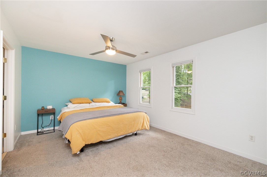 4330 Waumsetta Road Richmond, VA 23235 - Photo 17 of 35 a bedroom with a bed and window