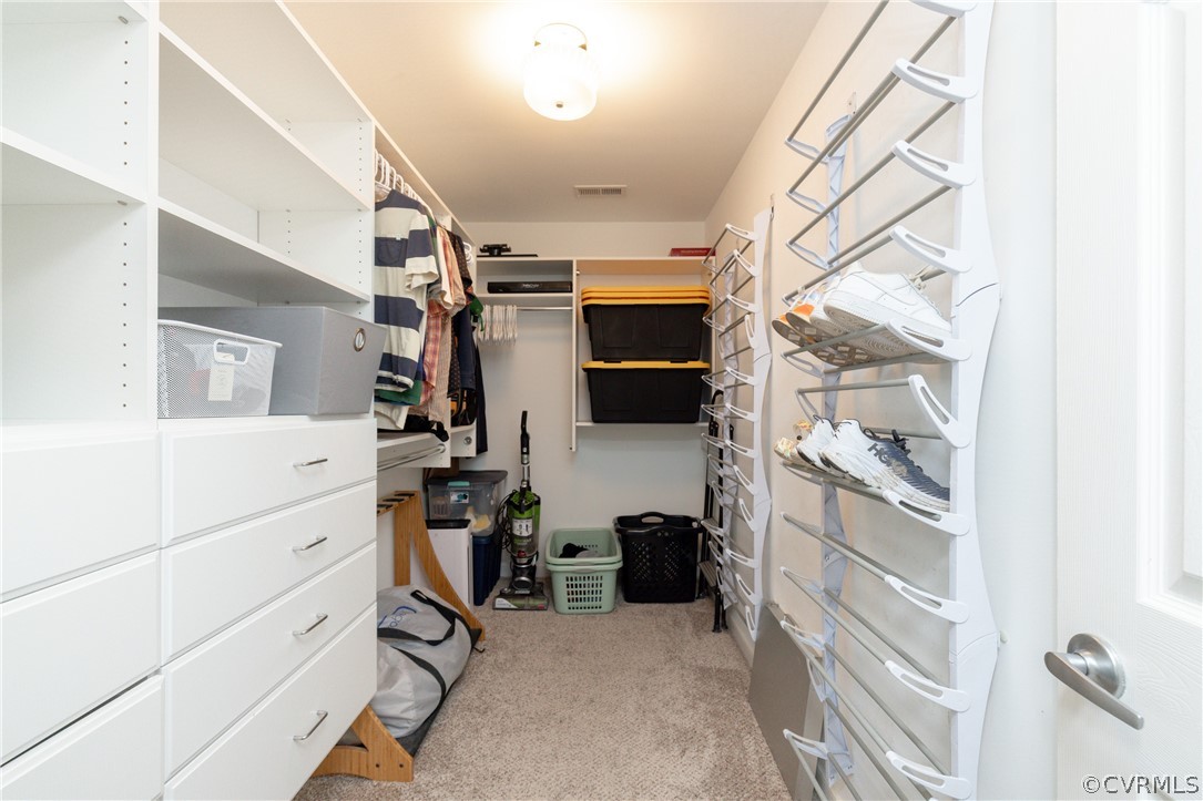 4330 Waumsetta Road Richmond, VA 23235 - Photo 20 of 35 a view of a hallway with workspace and closet