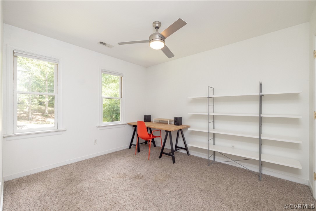 4330 Waumsetta Road Richmond, VA 23235 - Photo 23 of 35 a view of a livingroom with furniture and windows