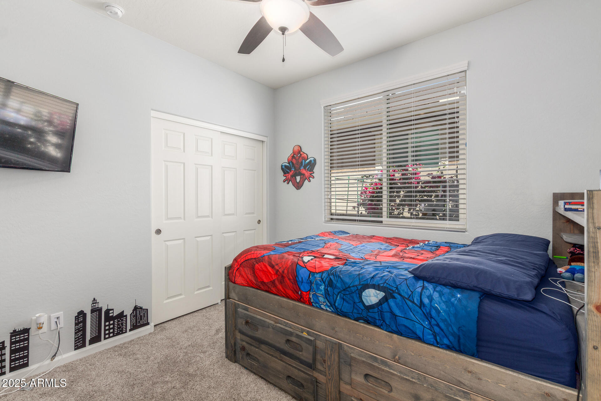 4136 West Palace Station Road New River, AZ 85087 - Photo 13 of 19 a bedroom with a bed and a window