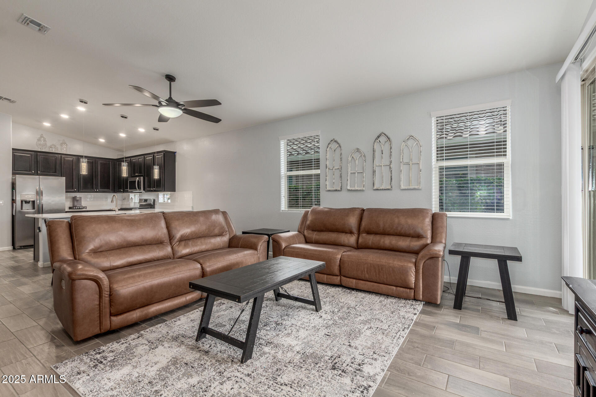 4136 West Palace Station Road New River, AZ 85087 - Photo 3 of 19 a living room with furniture and a window