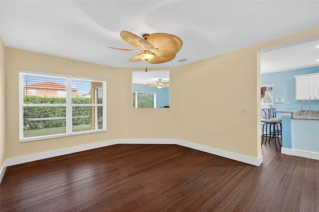 a view of an empty room with a window