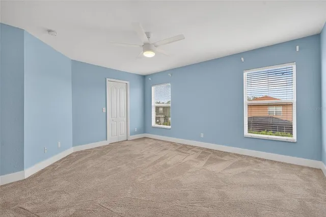 a view of a room with a large window