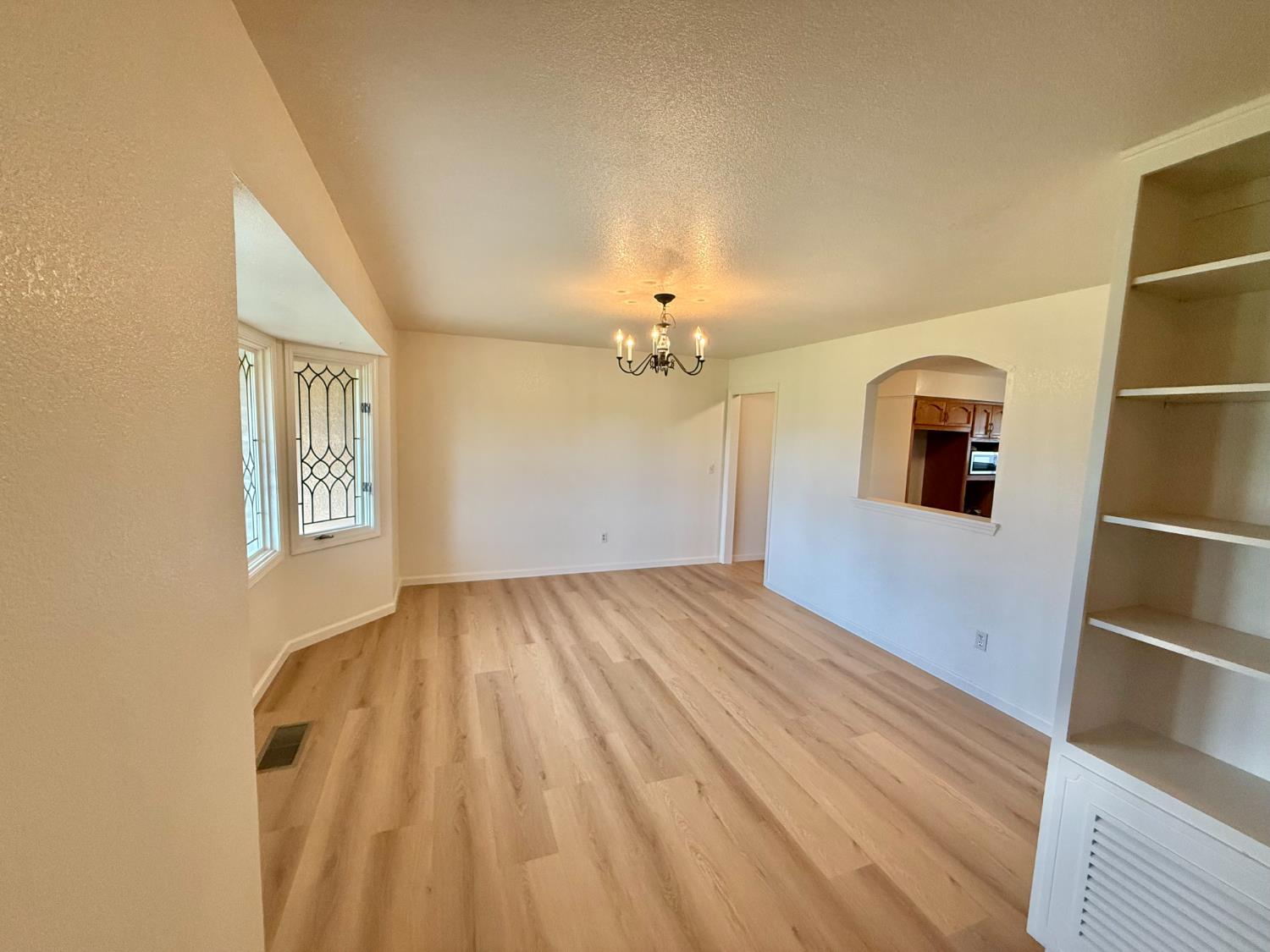 2524 B&B Boulevard Merced, CA 95348 - Photo 10 of 26 a view of livingroom with hardwood floor and hallway
