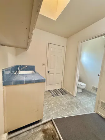 a utility room with washer and dryer